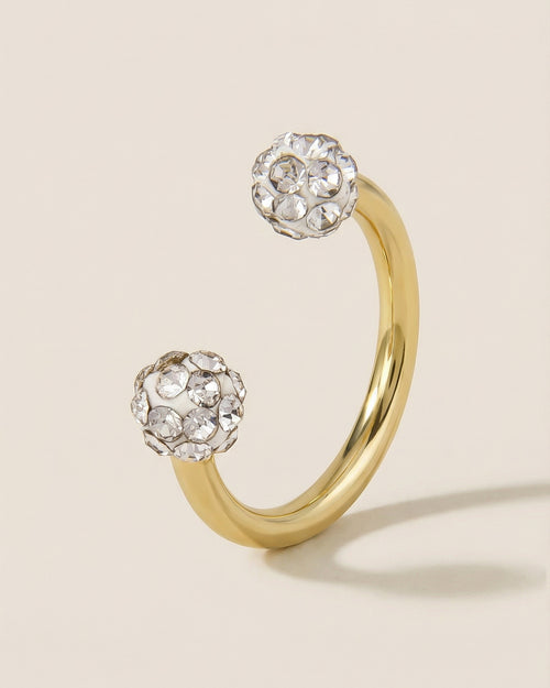 Altın renkli 316L cerrahi çelik 10 mm zirkon taşlı yarım halka piercing tasarımı.