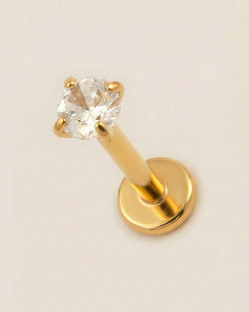 Altın renkli 316L cerrahi çelik 8 mm tektaş flatback tragus piercing tasarımı.