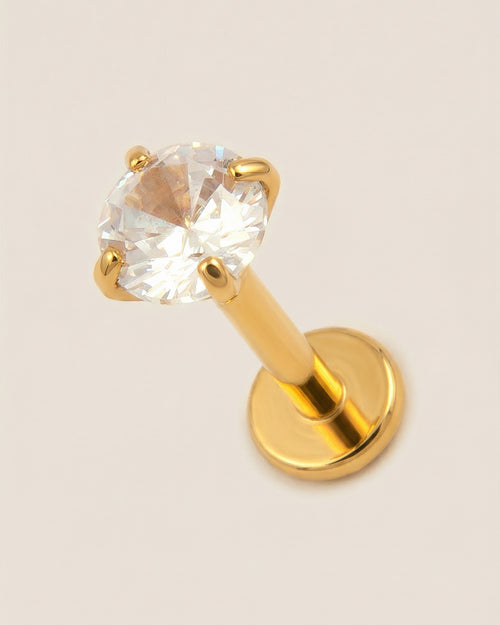 Altın renkli 316L cerrahi çelik 8 mm zirkon taşlı flatback tragus piercing tasarımı.