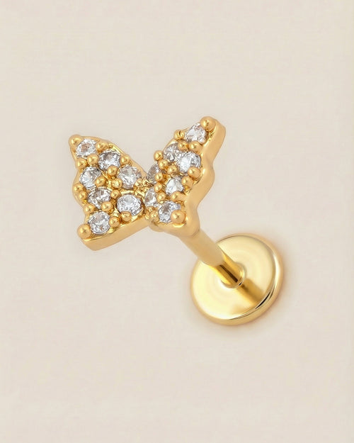 Altın renkli 316L cerrahi çelik pave zirkon taşlı kelebek flatback piercing.
