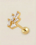 Altın renkli 316L cerrahi çelik yelpaze formlu zirkon taşlı tragus piercing tasarımı.