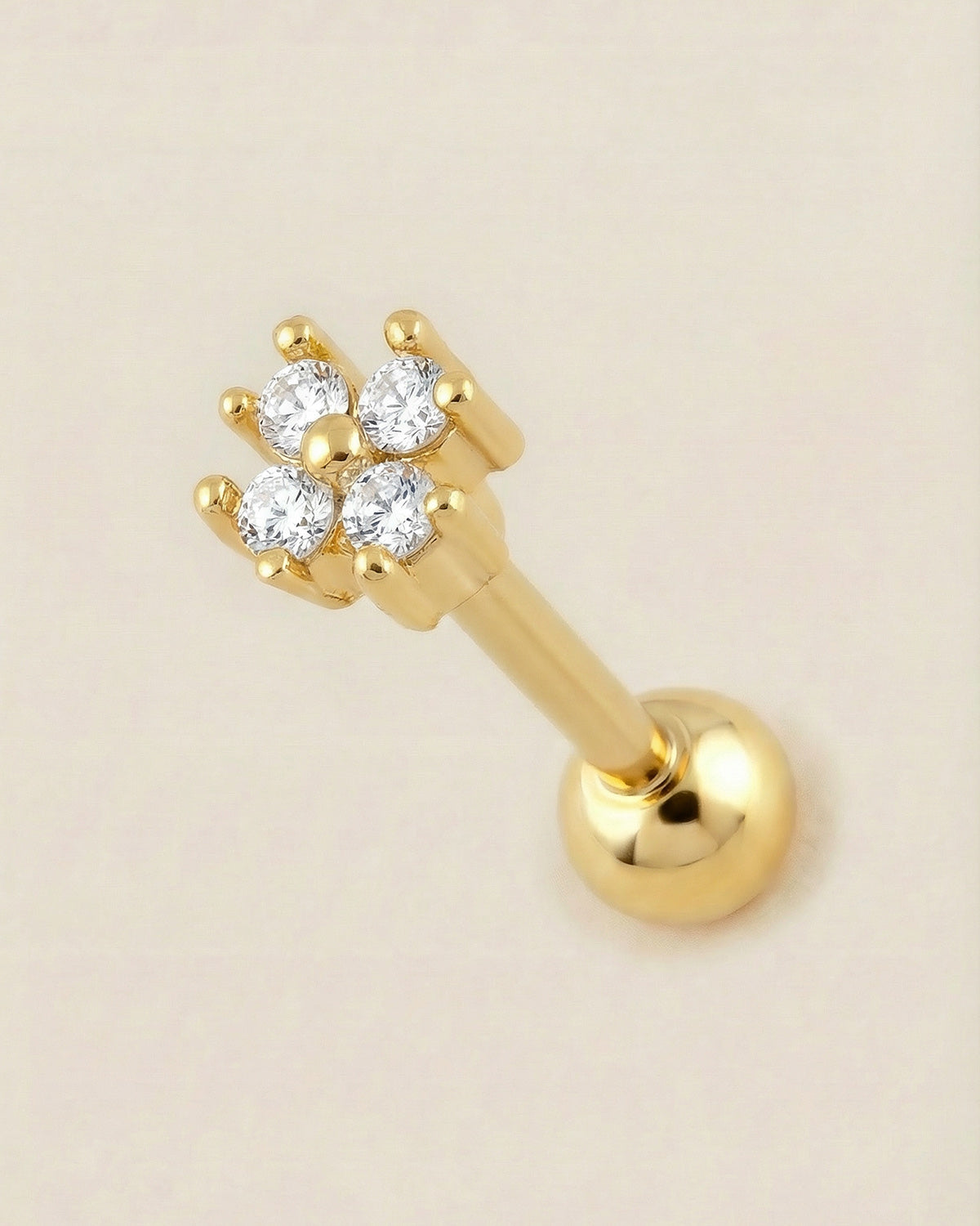 Altın renkli 316L cerrahi çelik zirkon dört taşlı yonca tragus piercing tasarımı.