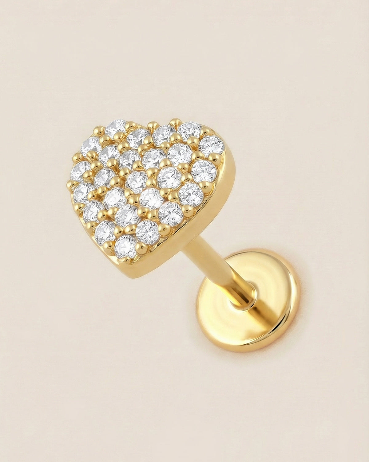 Altın renkli 316L cerrahi çelik zirkon taşlı kalp flatback piercing tasarımı.