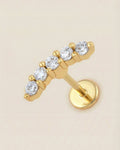 Altın renkli 316L cerrahi çelik zirkon taşlı minimal kavisli flatback piercing.