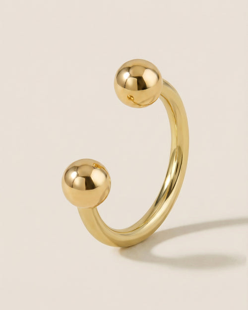 Altın renkli 316L cerrahi çelik 10 mm yarım halka piercing tasarımı.