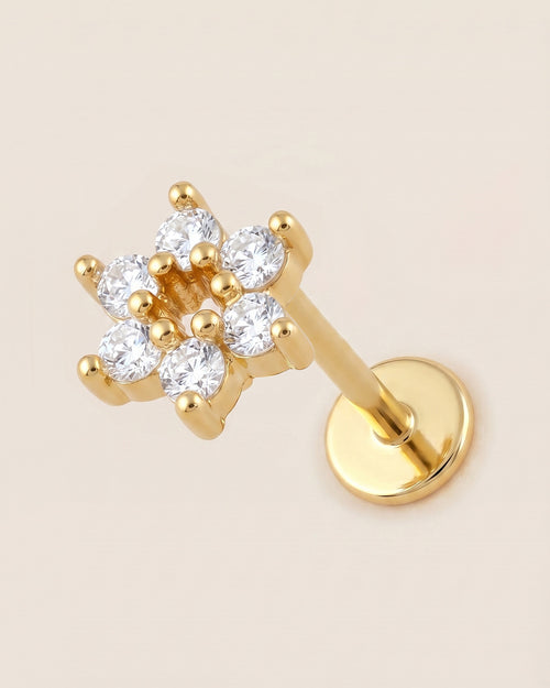Altın renkli 316L cerrahi çelik çiçek flatback piercing tasarımı.
