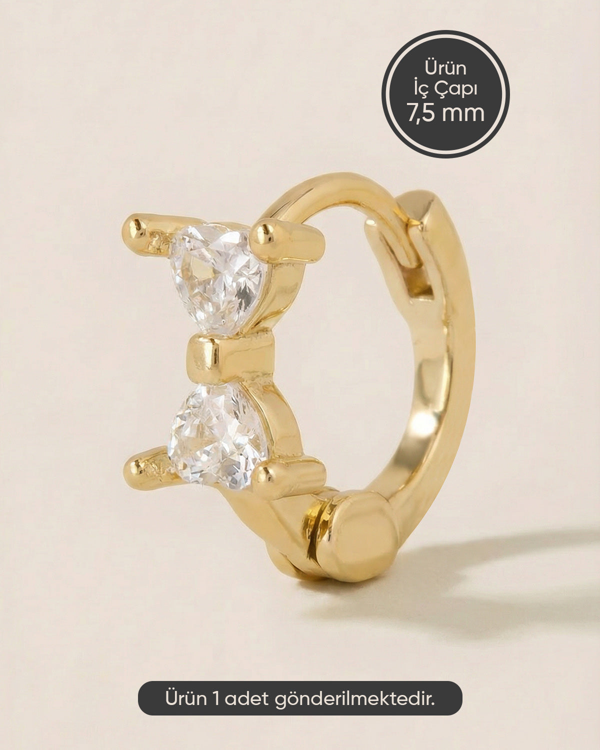 Altın renkli 316L cerrahi çelik fiyonk zirkon taşlı halka piercing tasarımı.