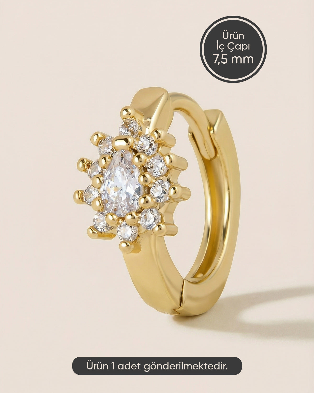 Altın renkli 316L cerrahi çelik halo montür oval zirkon taşlı halka piercing tasarımı.