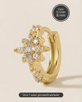 Altın renkli 316L cerrahi çelik kutup yıldızı zirkon taşlı halka piercing tasarımı.