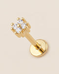 Altın renkli 316L cerrahi çelik minik zirkon taşlı flatback piercing tasarımı.