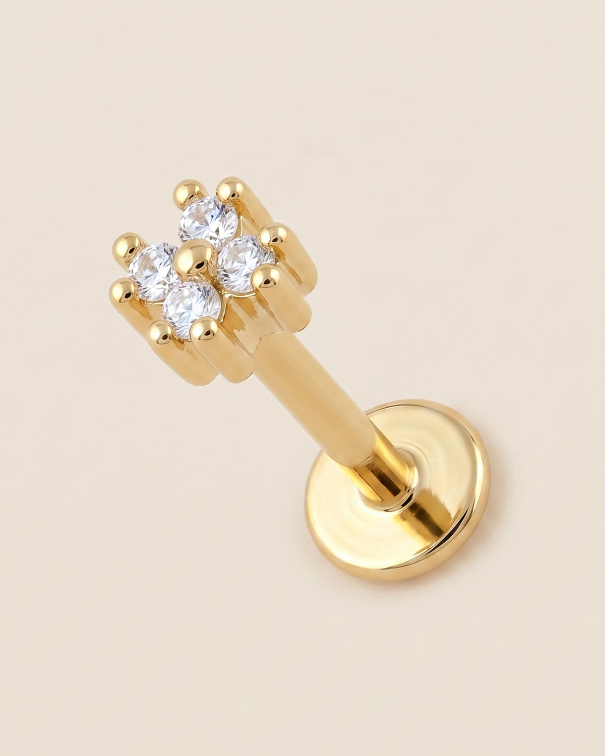 Altın renkli 316L cerrahi çelik minik zirkon taşlı flatback piercing tasarımı.