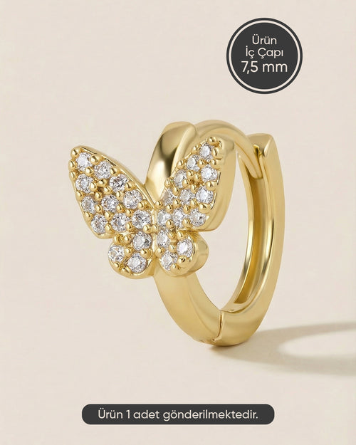 Altın renkli 316L cerrahi çelik pave zirkon taşlı kelebek halka piercing tasarımı.