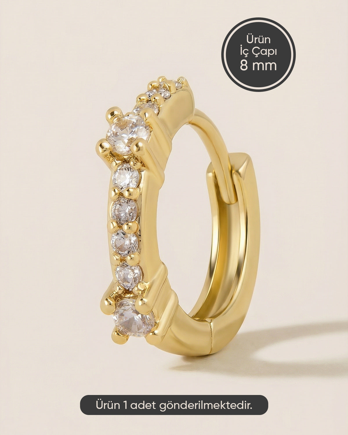 Altın renkli 316L cerrahi çelik sıralı küme zirkon taşlı halka piercing tasarımı.