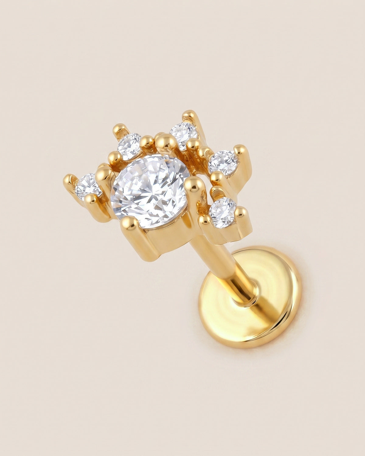Altın renkli 316L cerrahi çelik yarım güneş figürlü flatback piercing tasarımı.