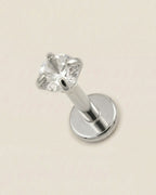 Gümüş renkli 316L cerrahi çelik 6 mm tektaş flatback tragus piercing tasarımı.