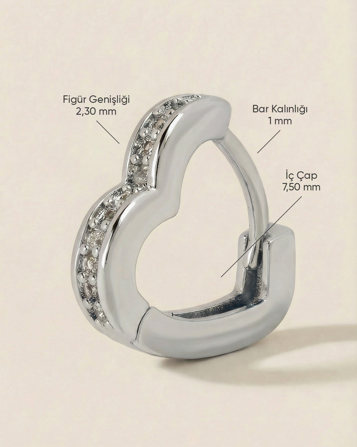 Gümüş renkli çelik açık kalp formlu zirkon taşlı halka piercingin ölçüleri.