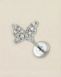 Gümüş renkli 316L cerrahi çelik pave zirkon taşlı kelebek flatback piercing.