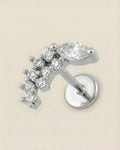 Gümüş renkli 316L cerrahi çelik zirkon taşlı kavisli flatback piercing tasarımı.