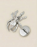 Gümüş renkli 316L cerrahi çelik zirkon taşlı örümcek figür flatback piercing.