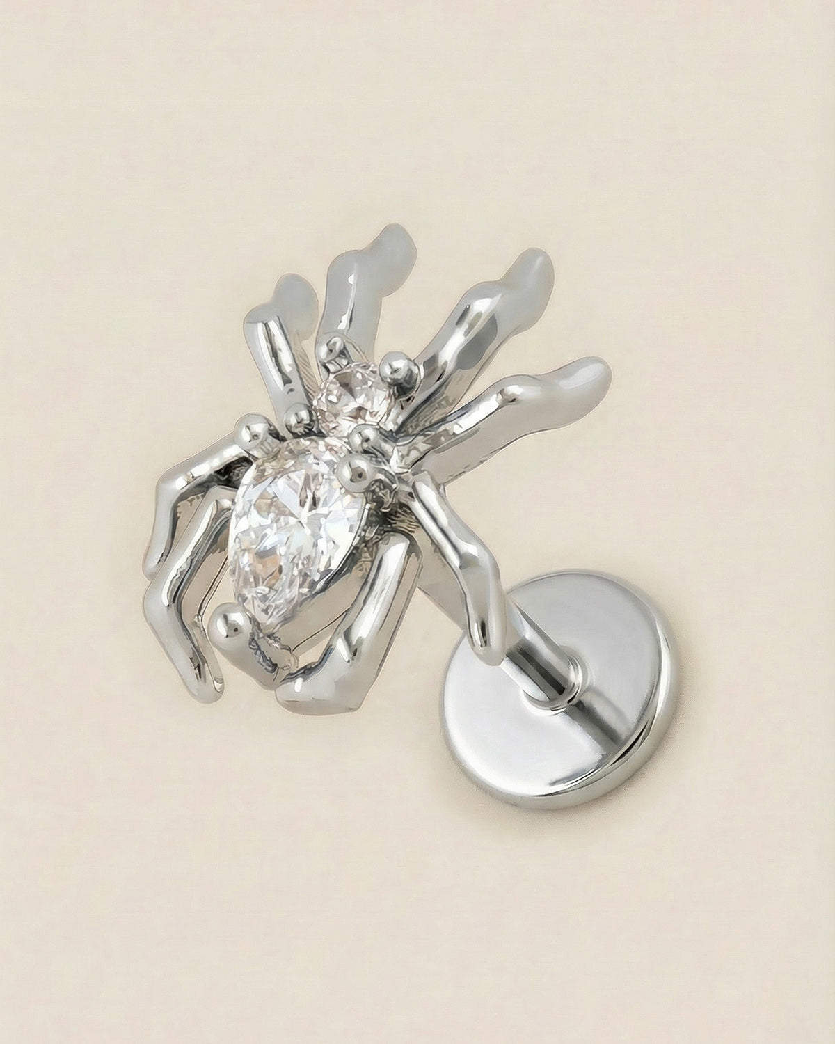 Gümüş renkli 316L cerrahi çelik zirkon taşlı örümcek figür flatback piercing.