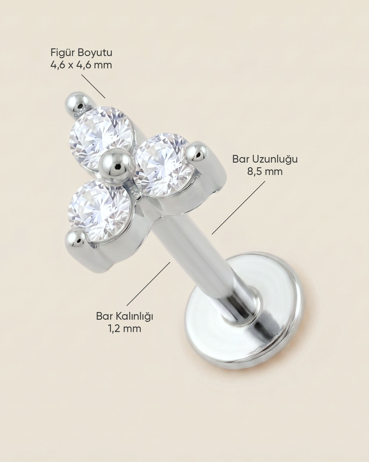 Gümüş renkli 316L cerrahi çelik 3 taşlı flatback piercingin ölçü görseli.