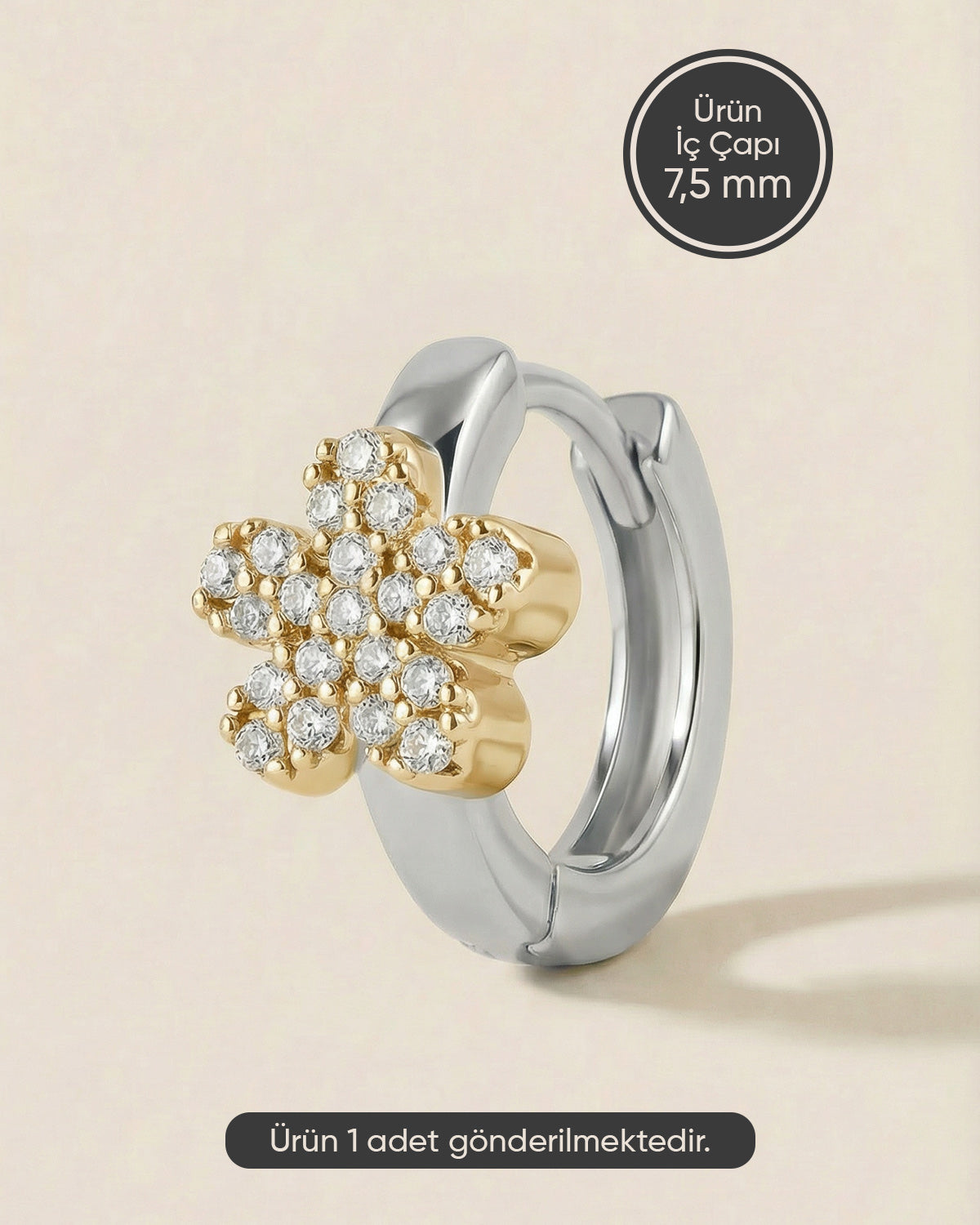 Gümüş renkli 316L cerrahi çelik altın detaylı çiçek zirkon taşlı halka piercing tasarımı.