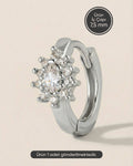Gümüş renkli 316L cerrahi çelik halo montür oval zirkon taşlı halka piercing tasarımı.