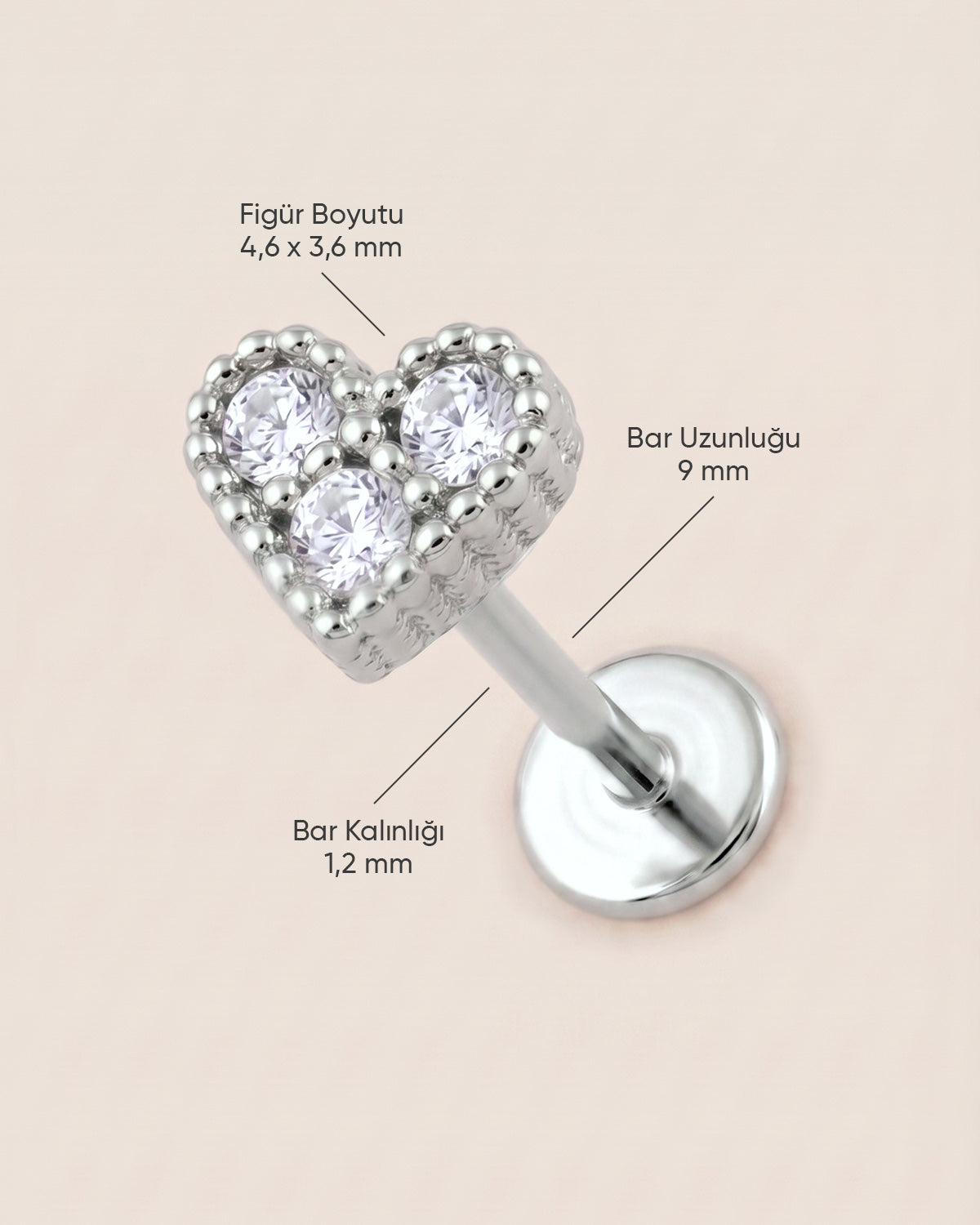 Gümüş renkli 316L cerrahi çelik kalp figürlü flatback piercingin ölçü görseli.