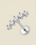 Gümüş renkli 316L cerrahi çelik kavisli 5 zirkon taşlı flatback piercing tasarımı.