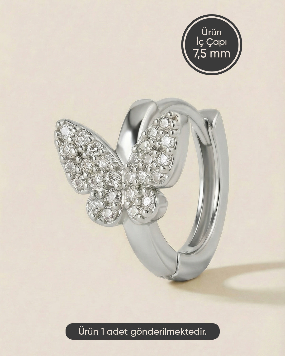 Gümüş renkli 316L cerrahi çelik pave zirkon taşlı kelebek halka piercing tasarımı.