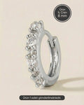 Gümüş renkli 316L cerrahi çelik tek sıra zirkon taşlı halka piercing tasarımı.