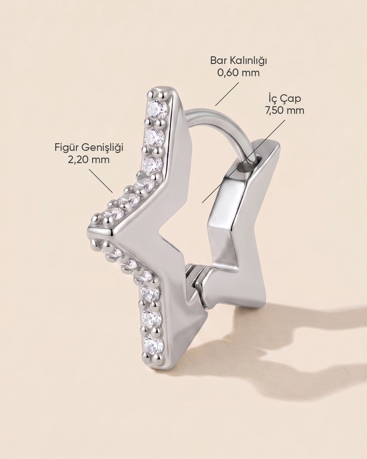 Gümüş renkli cerrahi çelik yıldız biçimli 7,50 mm zirkon taşlı halka piercingin ölçü görseli.